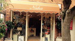 Nuha Shoes logo